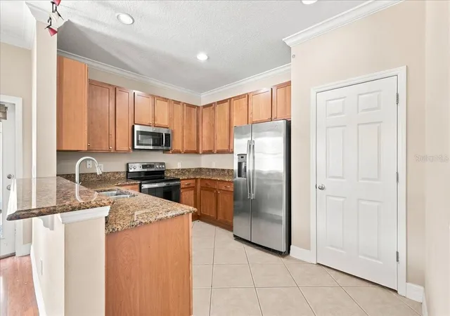 Photo 3 of Townhouse for sale at 2403 S Shine Ave #B, Orlando, FL 32806 | MLS# O6405895 | Listing updated on 2026-09-14