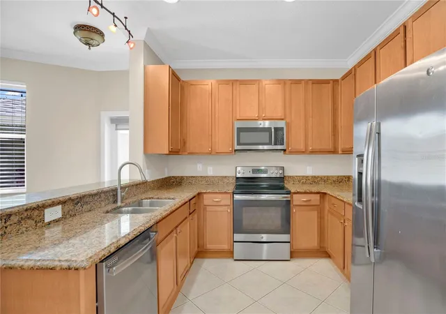 Photo 3 of Townhouse for sale at 2403 S Shine Ave #B, Orlando, FL 32806 | MLS# O6405895 | Listing updated on 2026-09-14