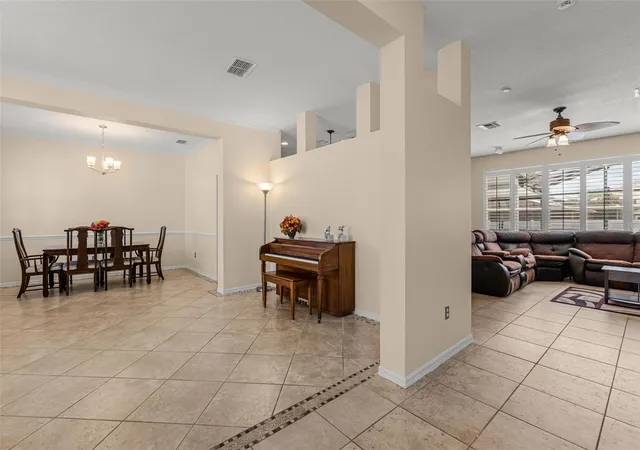 Photo 4 of Single family home for sale at 1573 Anna Catherine Dr, Orlando, FL 32828 | MLS# O6405979 | Listing updated on 2026-09-21