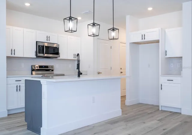 Photo 3 of Single family home for sale at 2434 Amnesty Dr, North Port, FL 34288 | MLS# O6406005 | Listing updated on 2026-08-07