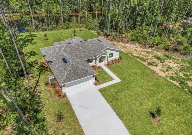 Photo 3 of Single family home for sale at 107 Pepperdine Dr, Palm Coast, FL 32164 | MLS# FC318395 | Listing updated on 2026-09-05