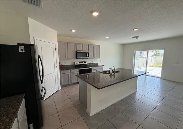 4th image of 2029 Maple Ridge Dr, Zellwood, FL 32798 | MLS# O6406112