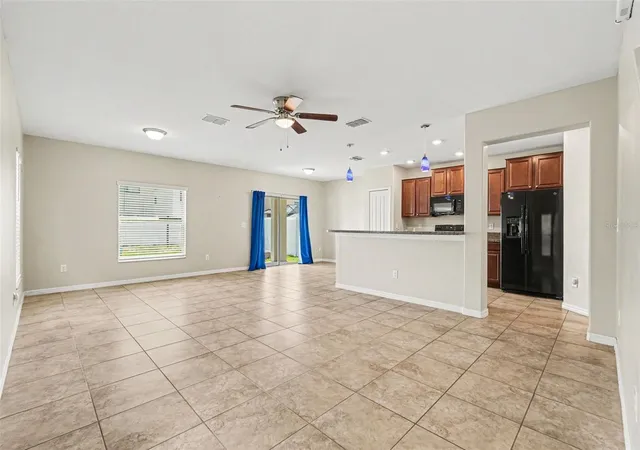 Photo 3 of Single family home for sale at 7421 French Marigold Ave, Tampa, FL 33619 | MLS# TB8506689 | Listing updated on 2026-09-17