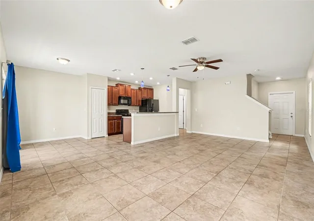 Photo 4 of Single family home for sale at 7421 French Marigold Ave, Tampa, FL 33619 | MLS# TB8506689 | Listing updated on 2026-09-17