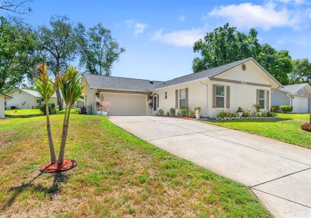 1st image of 10520 Springwood Dr, Port Richey, FL 34668 | MLS# W7885619