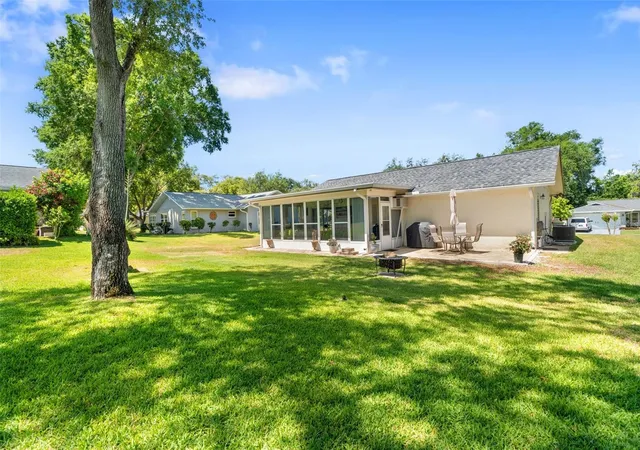 5th image of 10520 Springwood Dr, Port Richey, FL 34668 | MLS# W7885619