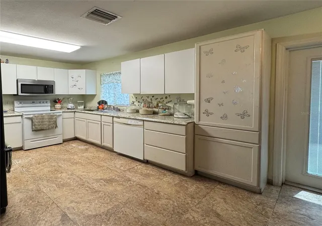 3rd image of 12309 Cambridge Ave, Tampa, FL 33624 | MLS# L4961776