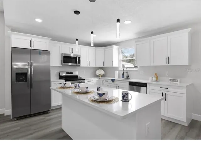 Photo 4 of Single family home for sale at 506 N Warnell St, Plant City, FL 33563 | MLS# TB8506962 | Listing updated on 2026-09-02
