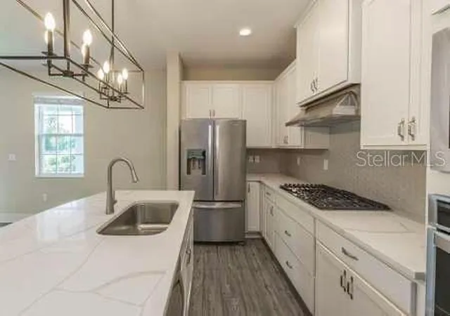 Photo 4 of Single family home for sale at 1391 Greenfield Loop, Kissimmee, FL 34747 | MLS# S5149597 | Listing updated on 2026-06-22