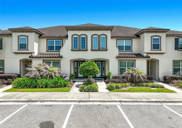 Photo 1 of Townhouse for sale at 8976 Amelia Downs Trl, Kissimmee, FL 34747 | MLS# O6406587 | Listing updated on 2026-10-27