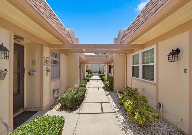 Photo 2 of Condo for sale at 11210 Carriage Hl Dr #5, PORT RICHEY, FL 34668 | MLS# TB8507125 | Listing updated on 2026-10-07