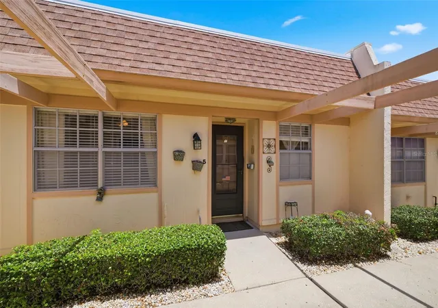 Photo 3 of Condo for sale at 11210 Carriage Hl Dr #5, Port Richey, FL 34668 | MLS# TB8507125 | Listing updated on 2026-10-07