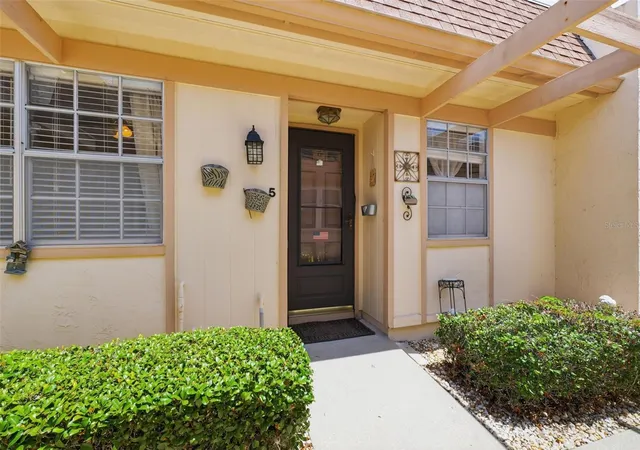 Listing Photo 4 - Condo for sale in building located at 11210 Carriage Hl Dr, PORT RICHEY, FL 34668 - Unit #5