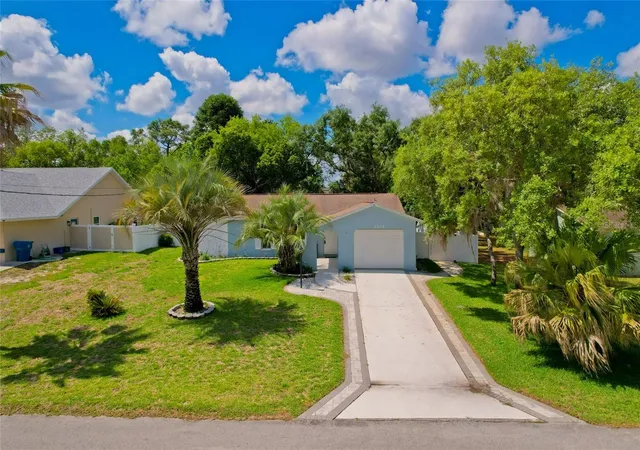 Photo 2 of Single family home for sale at 8218 Placid St, Spring Hill, FL 34606 | MLS# TB8507224 | Listing updated on 2026-09-17