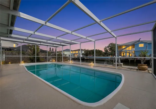Photo 3 of Single family home for sale at 7513 Hatteras Dr, Hudson, FL 34667 | MLS# W7885662 | Listing updated on 2026-05-14