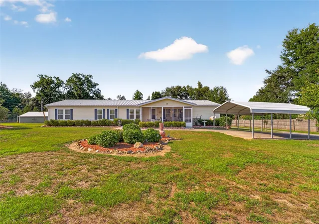 Photo 2 of Manufactured home for sale at 9706 US Hwy 301, Dade City, FL 33525 | MLS# W7885671 | Listing updated on 2026-09-22