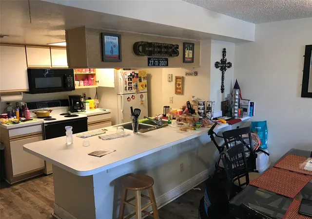 Photo 2 of Condo for sale at 2468 Sweetwater Clb Cir #111, Kissimmee, FL 34746 | MLS# O6406837 | Listing updated on 2026-05-14