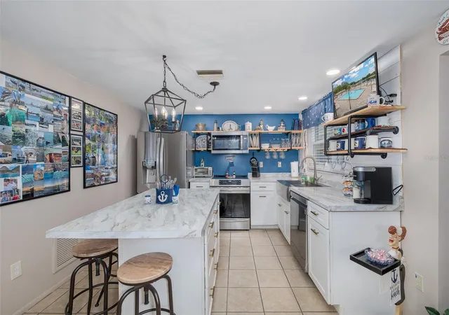 4th image of 8225 San Felipe Ct, Port Richey, FL 34668 | MLS# TB8507432