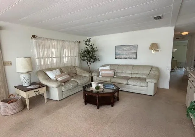 Photo 3 of Manufactured home for sale at 16 S Granada Plz, Englewood, FL 34223 | MLS# A4693291 | Listing updated on 2026-10-05