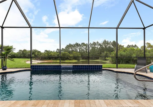 4th image of 32074 Pinfeld Dr, Wesley Chapel, FL 33543 | MLS# TB8507574