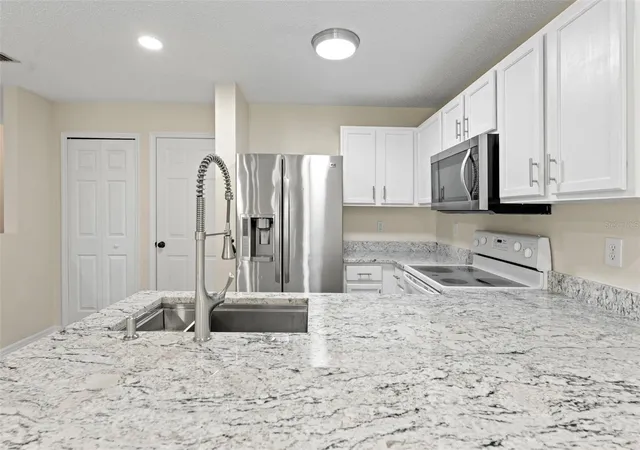 Photo 3 of Townhouse for sale at 8421 Edgewater Pl Blvd, Tampa, FL 33615 | MLS# TB8507628 | Listing updated on 2026-08-24