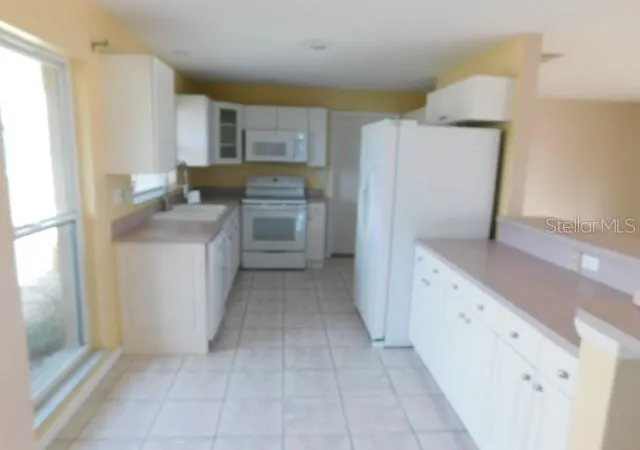 3rd image of 1313 Se 40Th St, Cape Coral, FL 33904 | MLS# K4903493