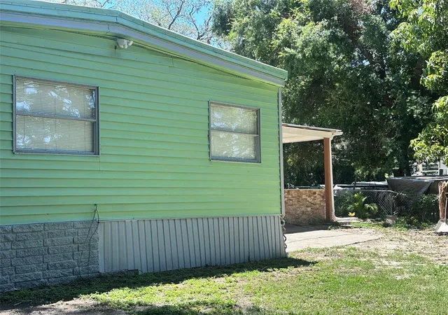 Photo 2 of Manufactured home for sale at 6606 Corbin Ln, New Port Richey, FL 34653 | MLS# TB8507976 | Listing updated on 2026-07-23