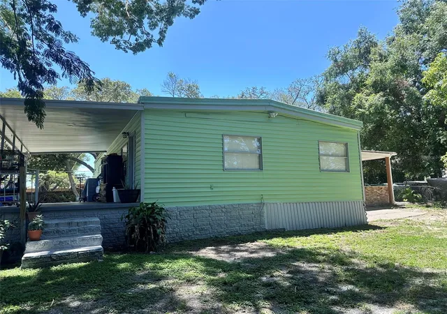 Photo 3 of Manufactured home for sale at 6606 Corbin Ln, New Port Richey, FL 34653 | MLS# TB8507976 | Listing updated on 2026-07-23