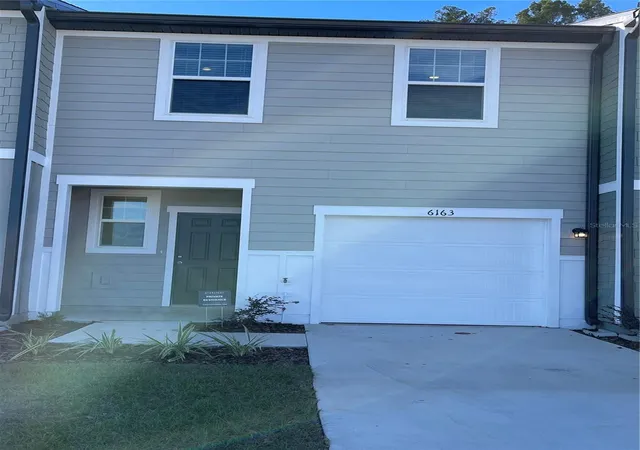 Photo 1 of Townhouse for sale at 6163 Daerr Ridge St, Zephyrhills, FL 33542 | MLS# TB8508161 | Listing updated on 2026-08-31