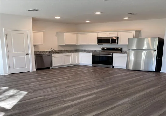 Photo 4 of Townhouse for sale at 6163 Daerr Ridge St, Zephyrhills, FL 33542 | MLS# TB8508161 | Listing updated on 2026-08-31
