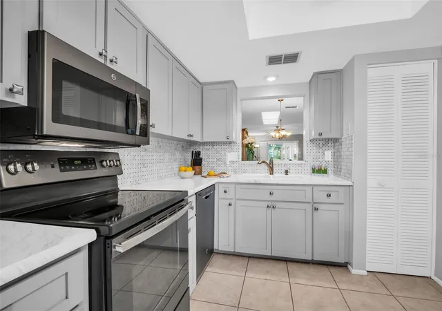 2nd image of 860 Maclaren Dr N #B, Palm Harbor, FL 34684 | MLS# TB8508226
