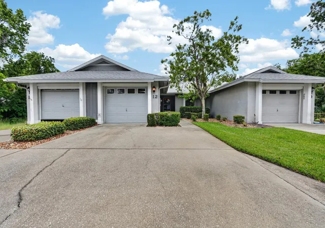 Photo 2 of Single family home for sale at 12 Lake Forest Cir N, Palm Coast, FL 32137 | MLS# FC318516 | Listing updated on 2026-05-31