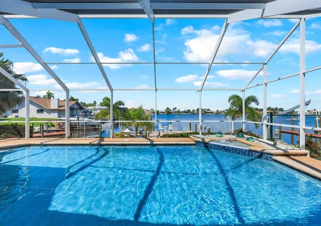 2nd image of 719 El Dorado Pkwy W, Cape Coral, FL 33914 | MLS# TB8508315