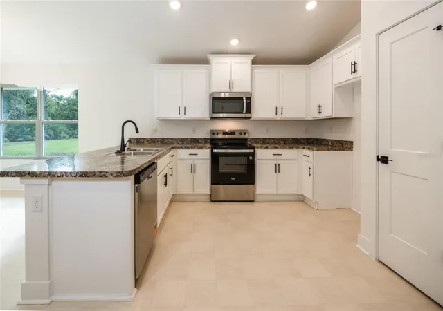 Photo 4 of Single family home for sale at 15 Birchwood Dr, Palm Coast, FL 32137 | MLS# FC318526 | Listing updated on 2026-10-15