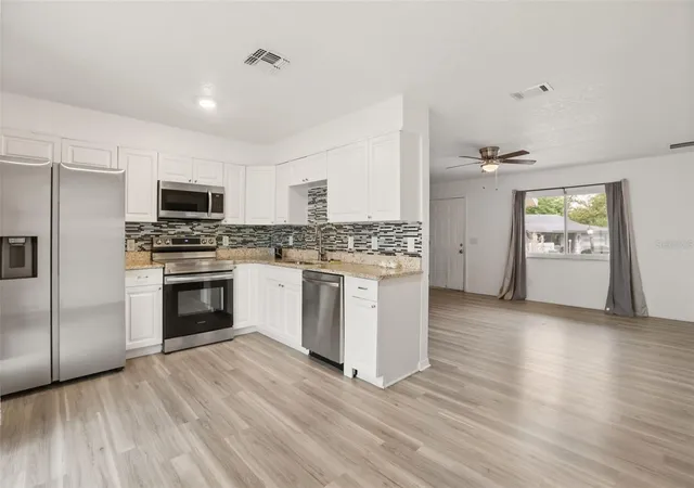 Homes for sale in Orlando, FL | 4650 Boca Vista Ct, Orlando, FL 32808 | MLS# S5149858