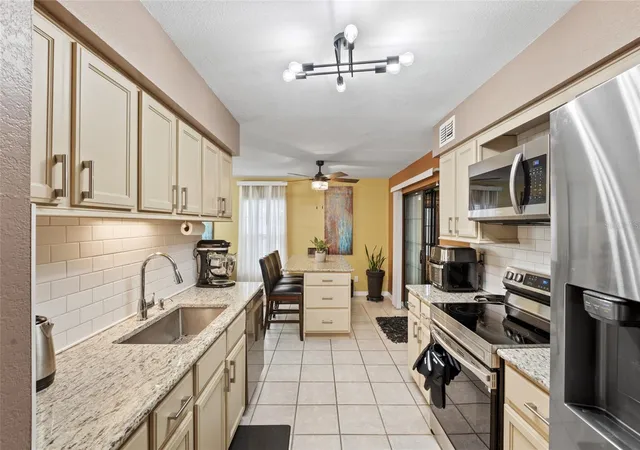 Photo 3 of Condo for sale at 100 E Oak Ter Dr #A2, Leesburg, FL 34748 | MLS# O6407728 | Listing updated on 2026-09-23