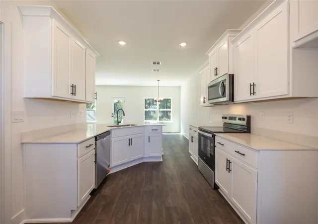Photo 2 of Single family home for sale at 18 Renmont Pl, Palm Coast, FL 32164 | MLS# FC318535 | Listing updated on 2026-10-28