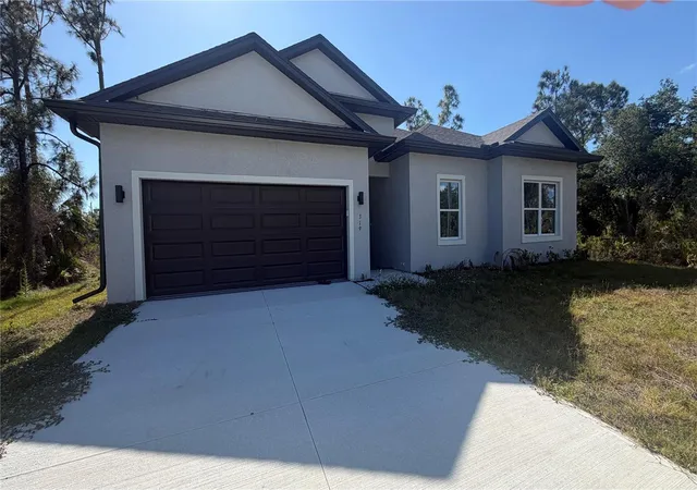 Photo 1 of Single family home for sale at 319 Spaulding St, Port Charlotte, FL 33953 | MLS# O6407774 | Listing updated on 2026-07-22