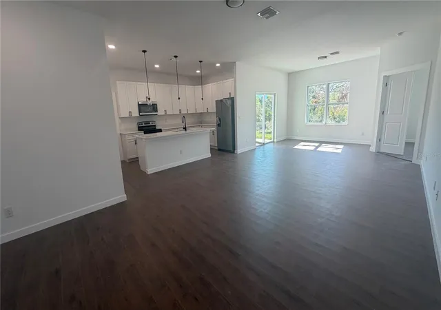 Photo 2 of Single family home for sale at 319 Spaulding St, Port Charlotte, FL 33953 | MLS# O6407774 | Listing updated on 2026-07-22