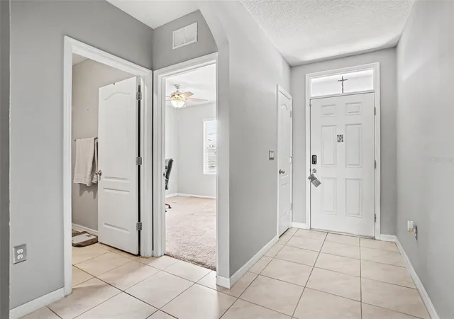 Photo 3 of Single family home for sale at 911 Waterville Dr, Auburndale, FL 33823 | MLS# TB8508539 | Listing updated on 2026-10-09