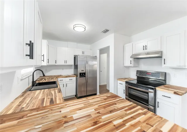Photo 4 of Single family home for sale at 5701 SW 47th Place, Gainesville, FL 32608 | MLS# GC540340 | Listing updated on 2026-08-19