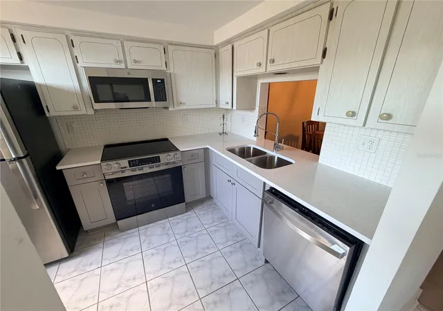 Photo 4 of Condo for sale at 4446 Rustic Dr #E, New Port Richey, FL 34652 | MLS# W7885776 | Listing updated on 2026-08-31