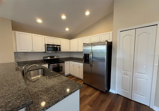 Photo 4 of Single family home for sale at 4735 Woodbrook Dr, Sarasota, FL 34243 | MLS# A4693683 | Listing updated on 2026-10-07