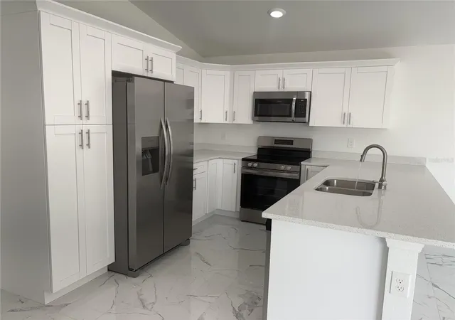 Photo 3 of Single family home for sale at 2810 NW 26th Place, Cape Coral, FL 33993 | MLS# C7526221 | Listing updated on 2026-10-21