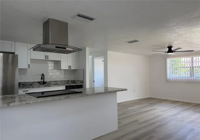 Photo 3 of Single family home for sale at 3821 Ave J Nw, Winter Haven, FL 33881 | MLS# TB8508879 | Listing updated on 2026-10-01