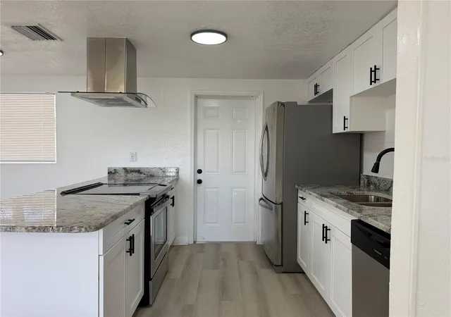 Photo 3 of Single family home for sale at 3821 Ave J NW, Winter Haven, FL 33881 | MLS# TB8508879 | Listing updated on 2026-10-01