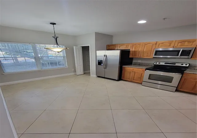 Photo 3 of Condo for sale at 3717 S Lake Orlando Pkwy #7, Orlando, FL 32808 | MLS# O6408141 | Listing updated on 2026-06-14