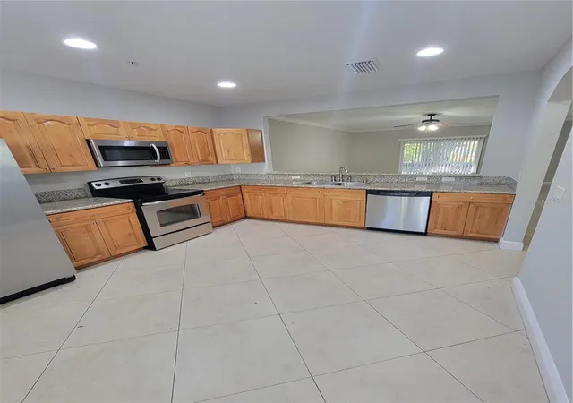 Photo 3 of Condo for sale at 3717 S Lake Orlando Pkwy #7, Orlando, FL 32808 | MLS# O6408141 | Listing updated on 2026-06-14