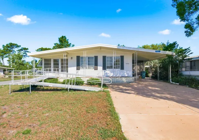 Photo 2 of Manufactured home for sale at 7557 Fairlane Ave, Brooksville, FL 34613 | MLS# TB8509027 | Listing updated on 2026-09-29