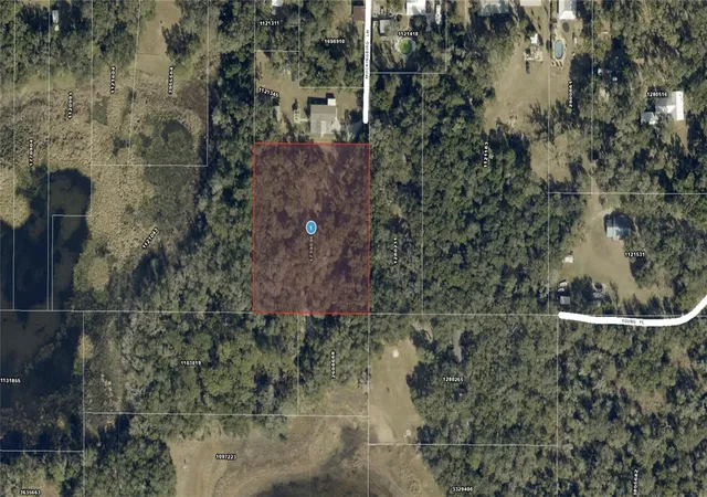 1st image of 128 Mockingbird Ln, Lady Lake, FL 32159 | MLS# OM724809